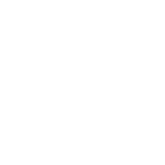 A black-and-white photo of a large group of people standing and sitting in rows, posing for a formal portrait.