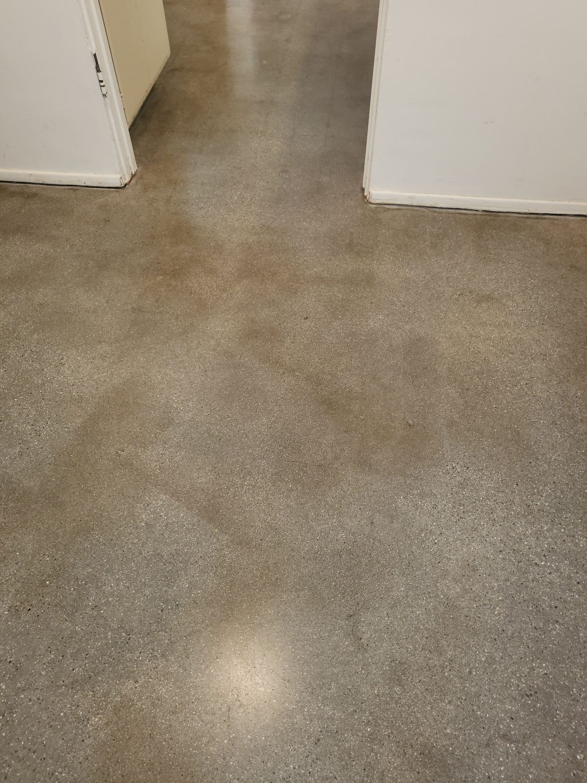 A close up of a concrete floor in a room.