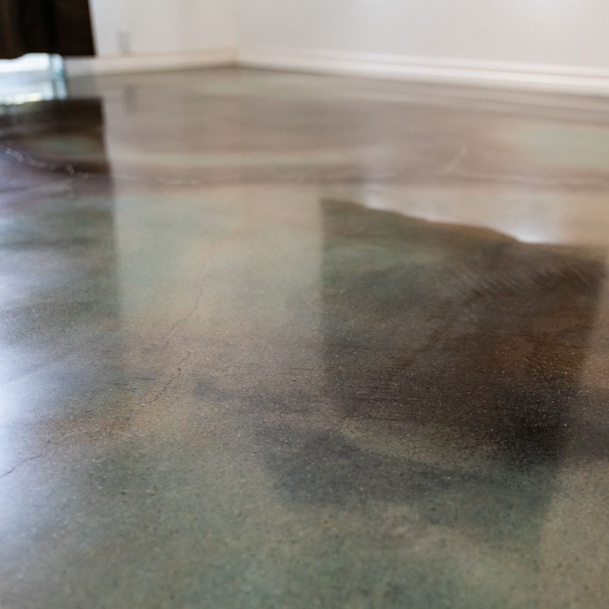 A close up of a concrete floor in a room.