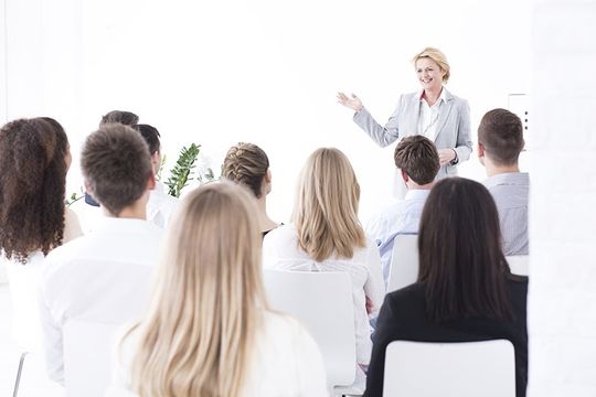 Woman giving training to team