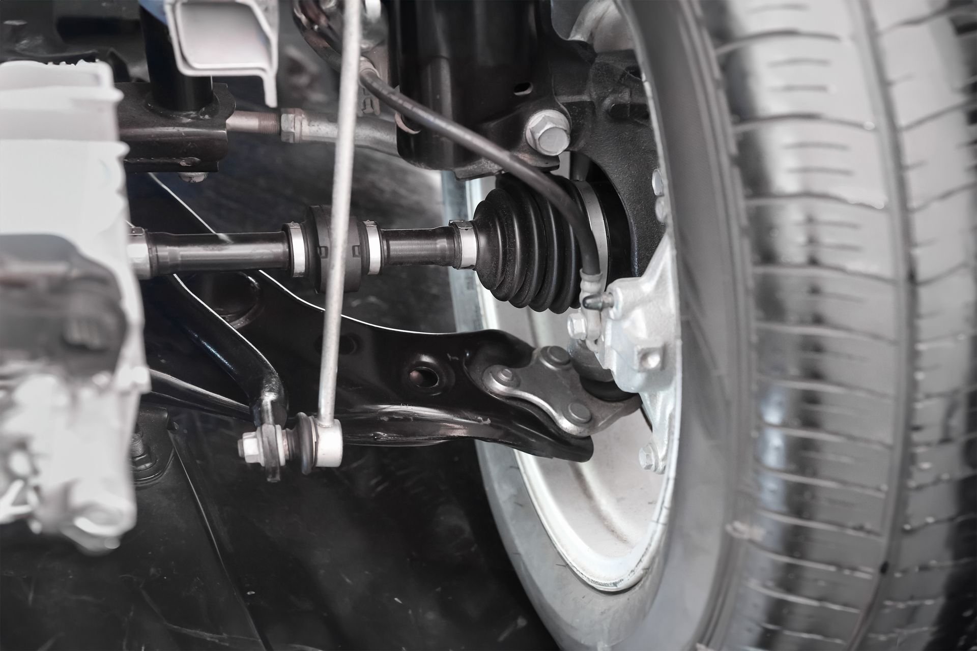 Car suspension system and driveshaft. Car suspension system and driveshaft.