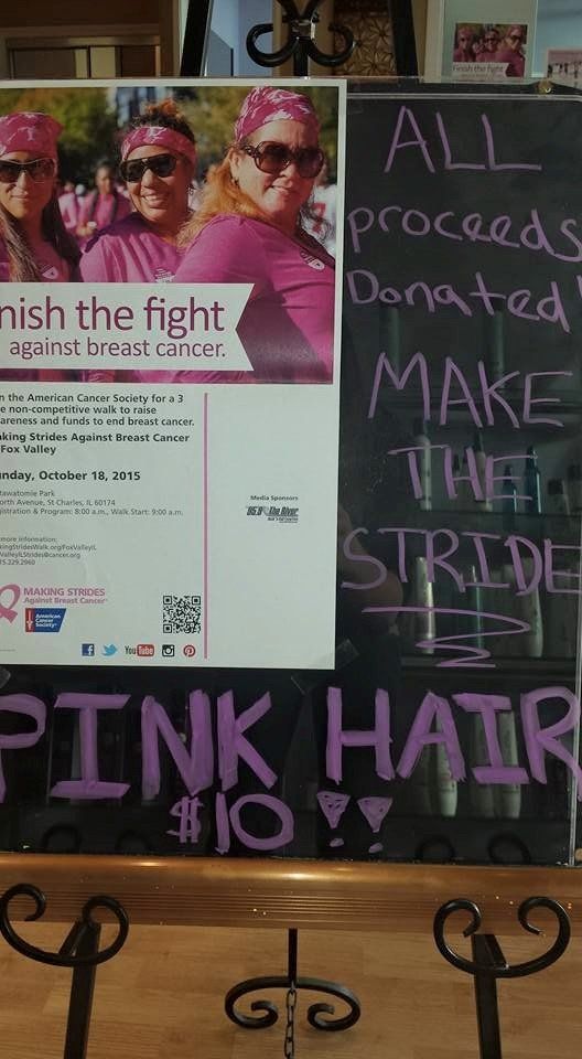 A chalkboard with a sign that says `` all proceeds donated make pink hair ''