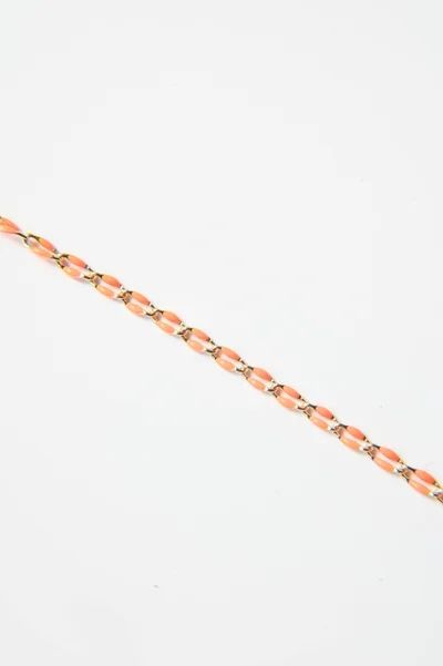 A close up of a chain on a white background.