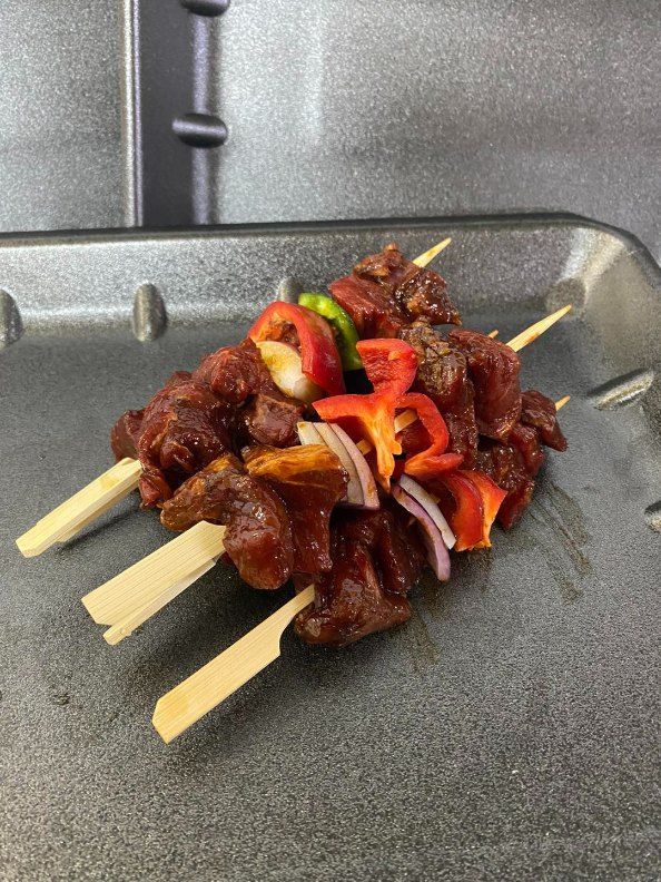 A Tray of Meat and Vegetables on Skewers on a Table — Fresco's Quality Meats (Retail) in Mackay, QLD