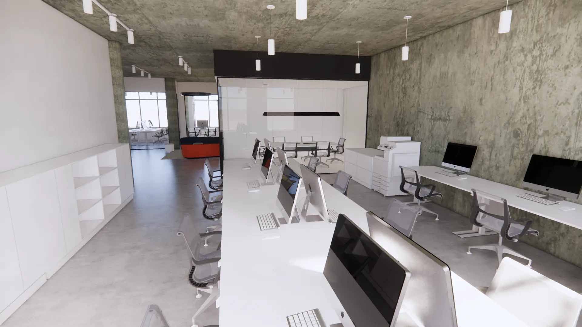 Un espace de bureau avec des rangées de bureaux, des chaises, des ordinateurs et une imprimante. Murs blancs et plafonds en béton.