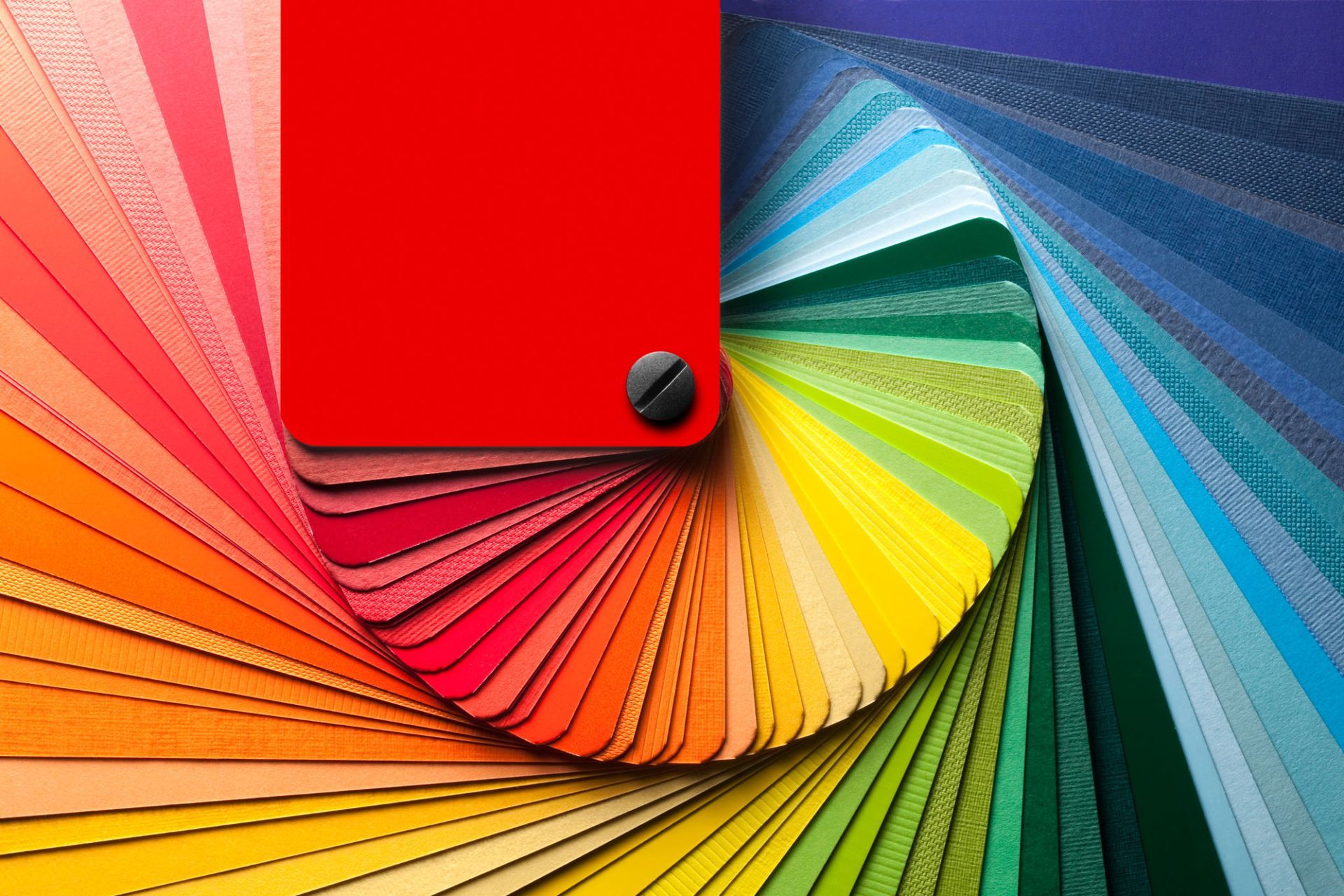 A rainbow colored fan with a red square in the middle — Overland Park, KS — Johnson County Solutions