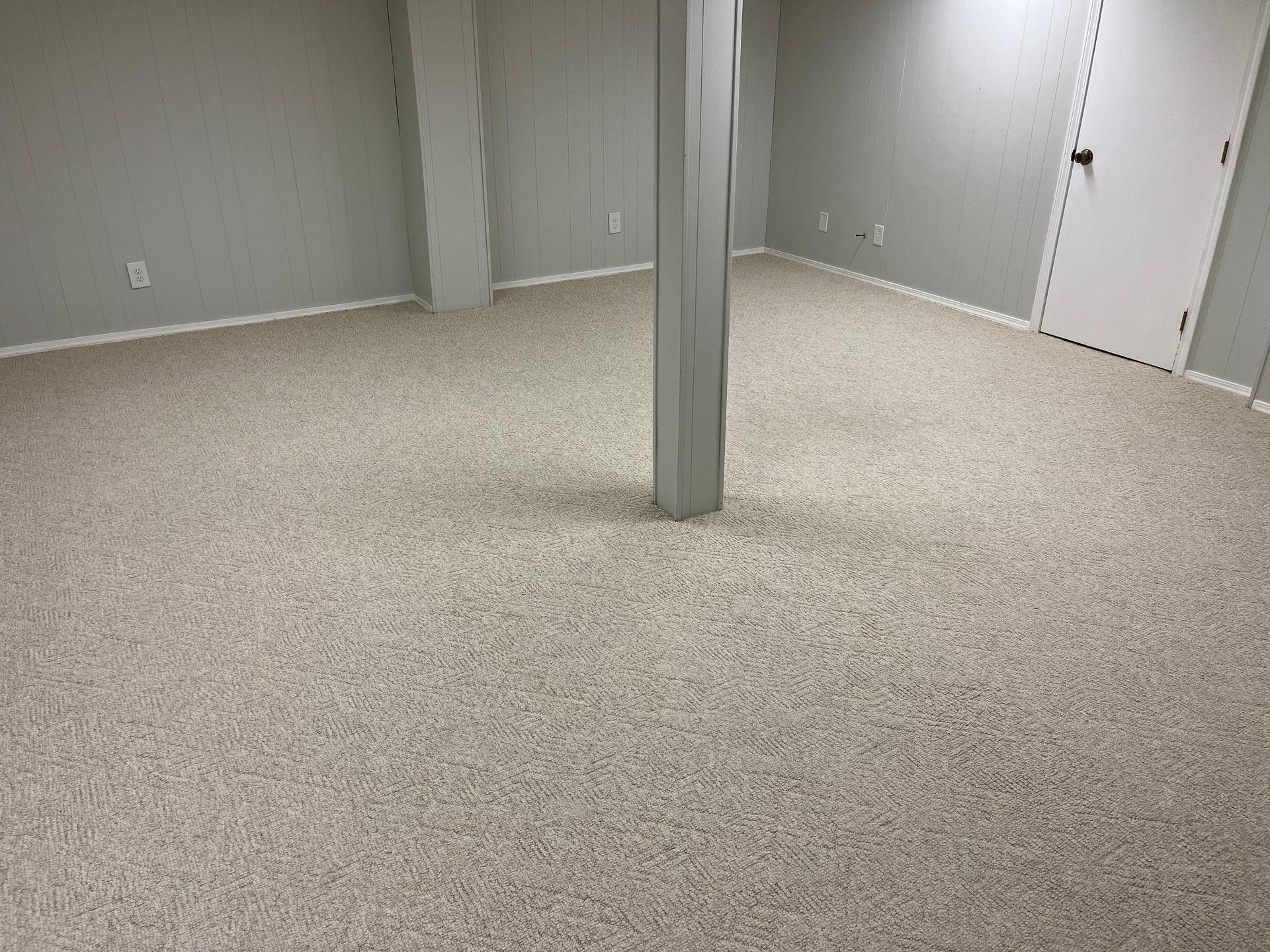 There is a pillar in the middle of the room.