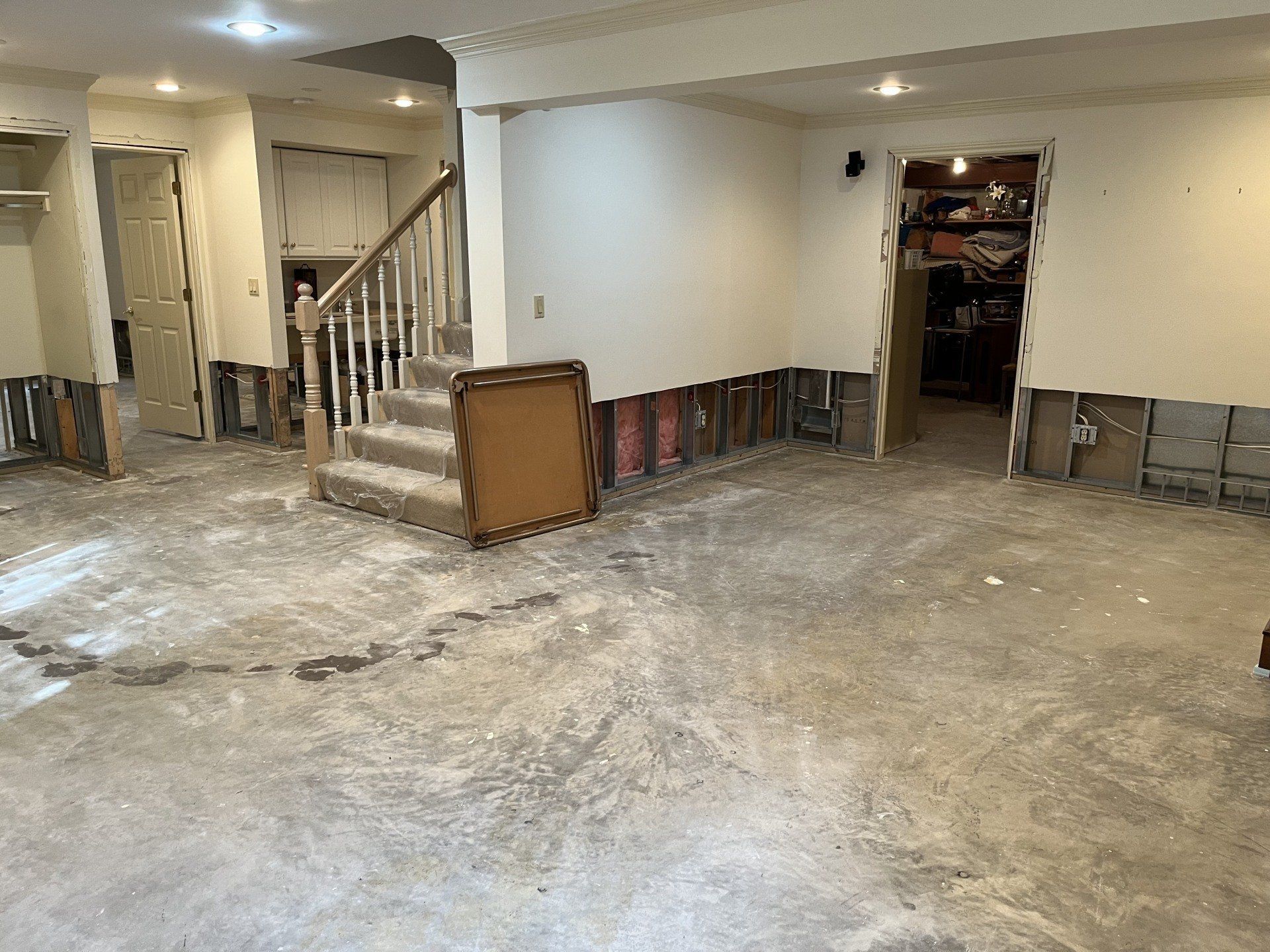 There is a staircase in the middle of the room.