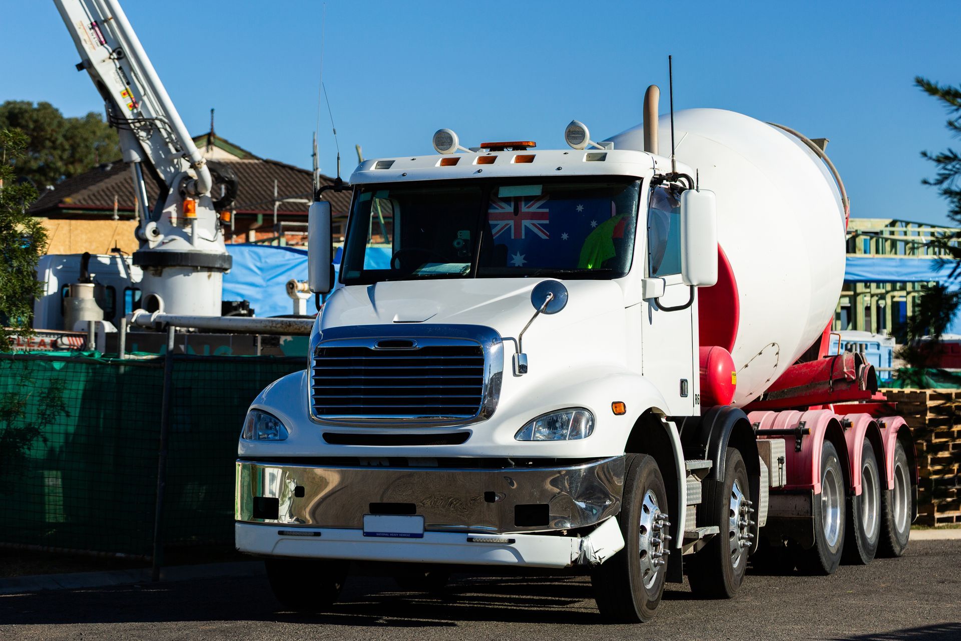 concrete mixer truck unloading at worksite concrete mixer truck unloading at worksite