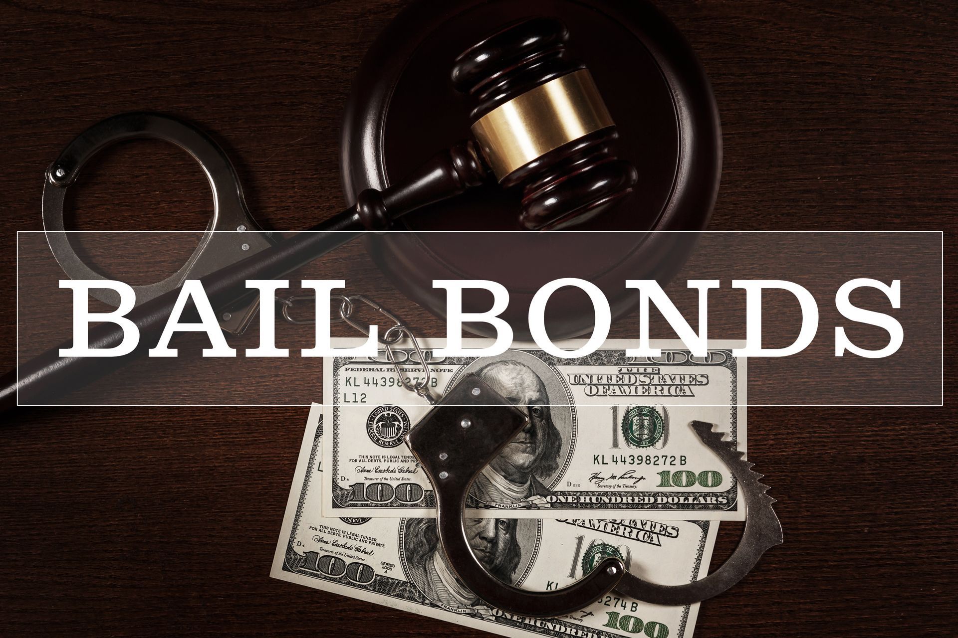 Gavel, handcuffs, and cash representing bail bonds and legal process.