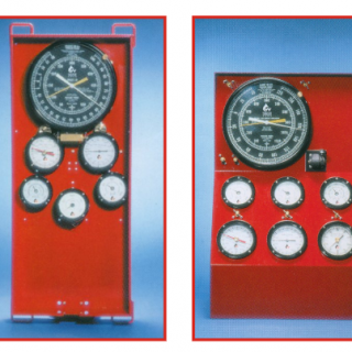 two pictures of a red panel with clocks on it