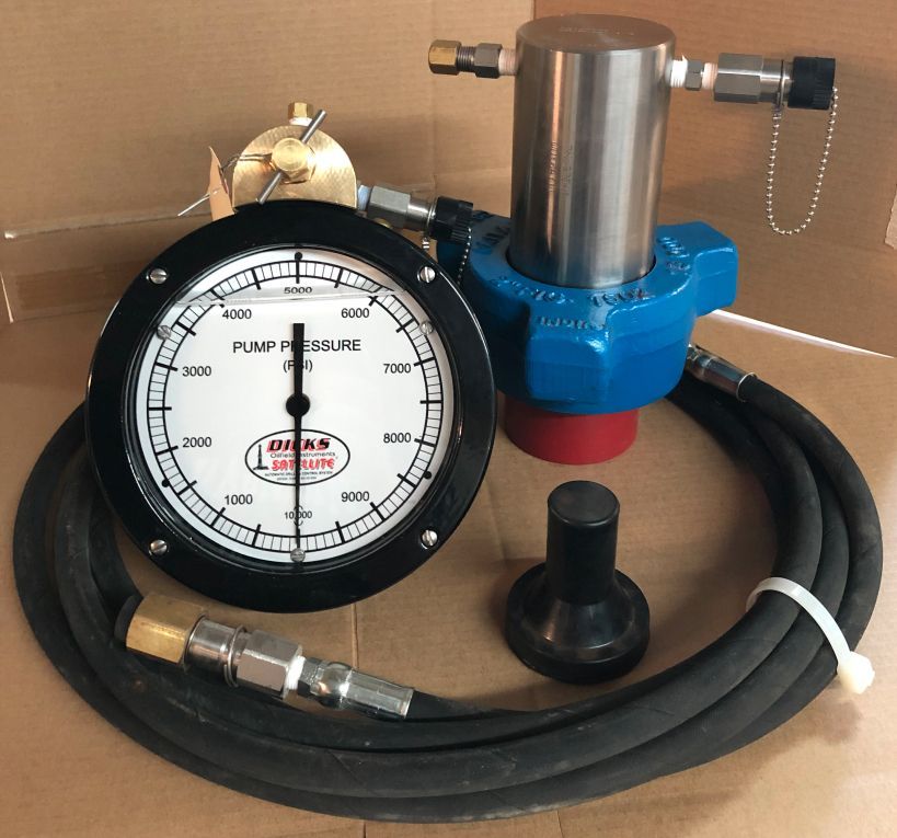 a pump pressure gauge with a hose attached to it