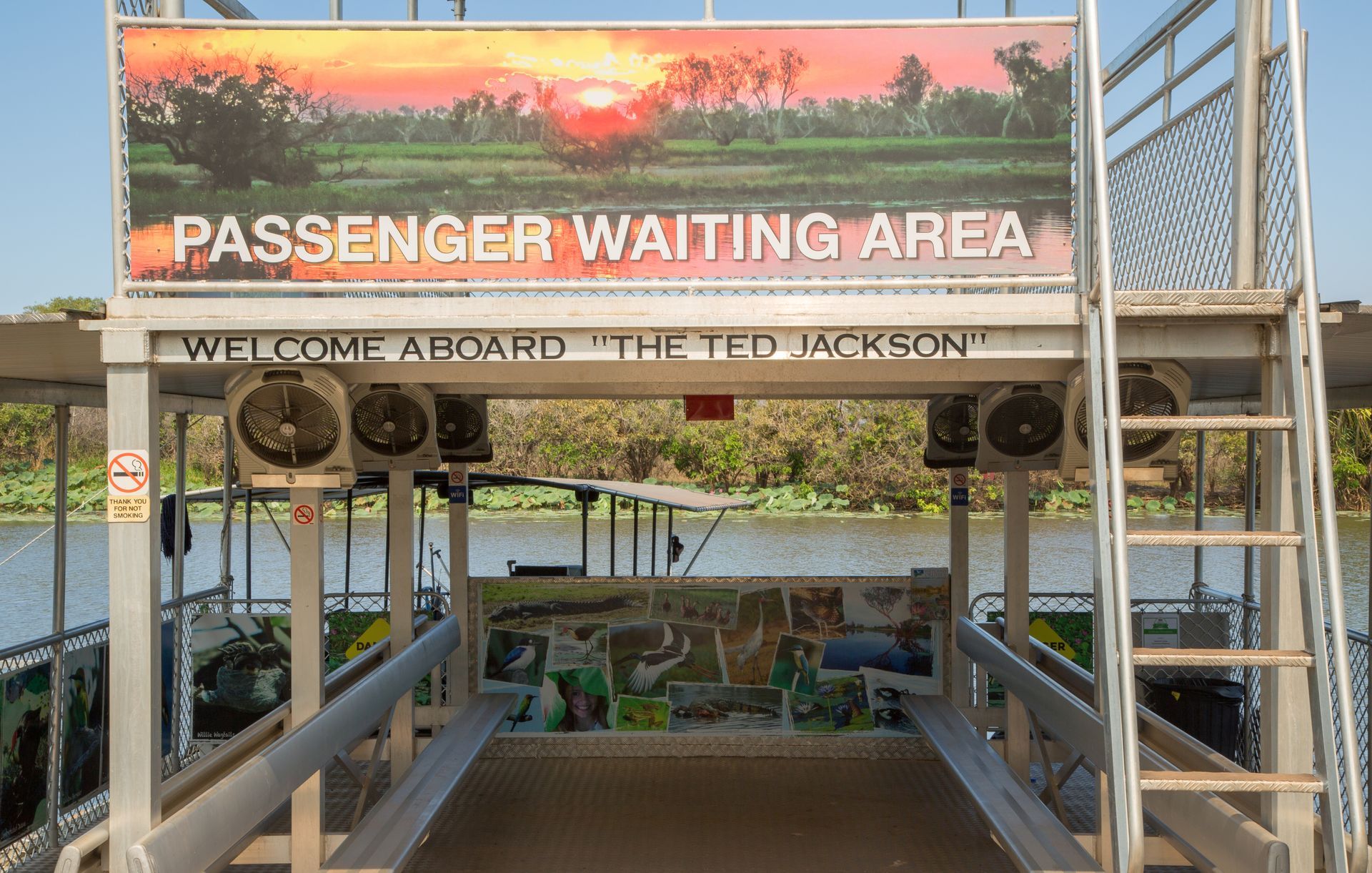 A sign that says passenger waiting area on it