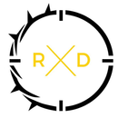 Black circular logo with yellow R X D letters inside and black jagged accents around the edge