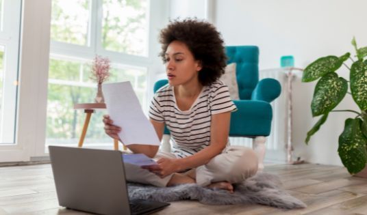 woman paying rent
