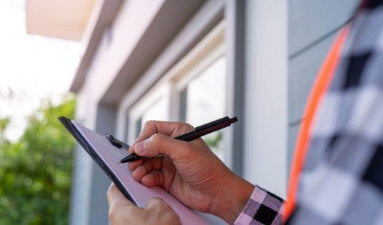man filling out maintenance request