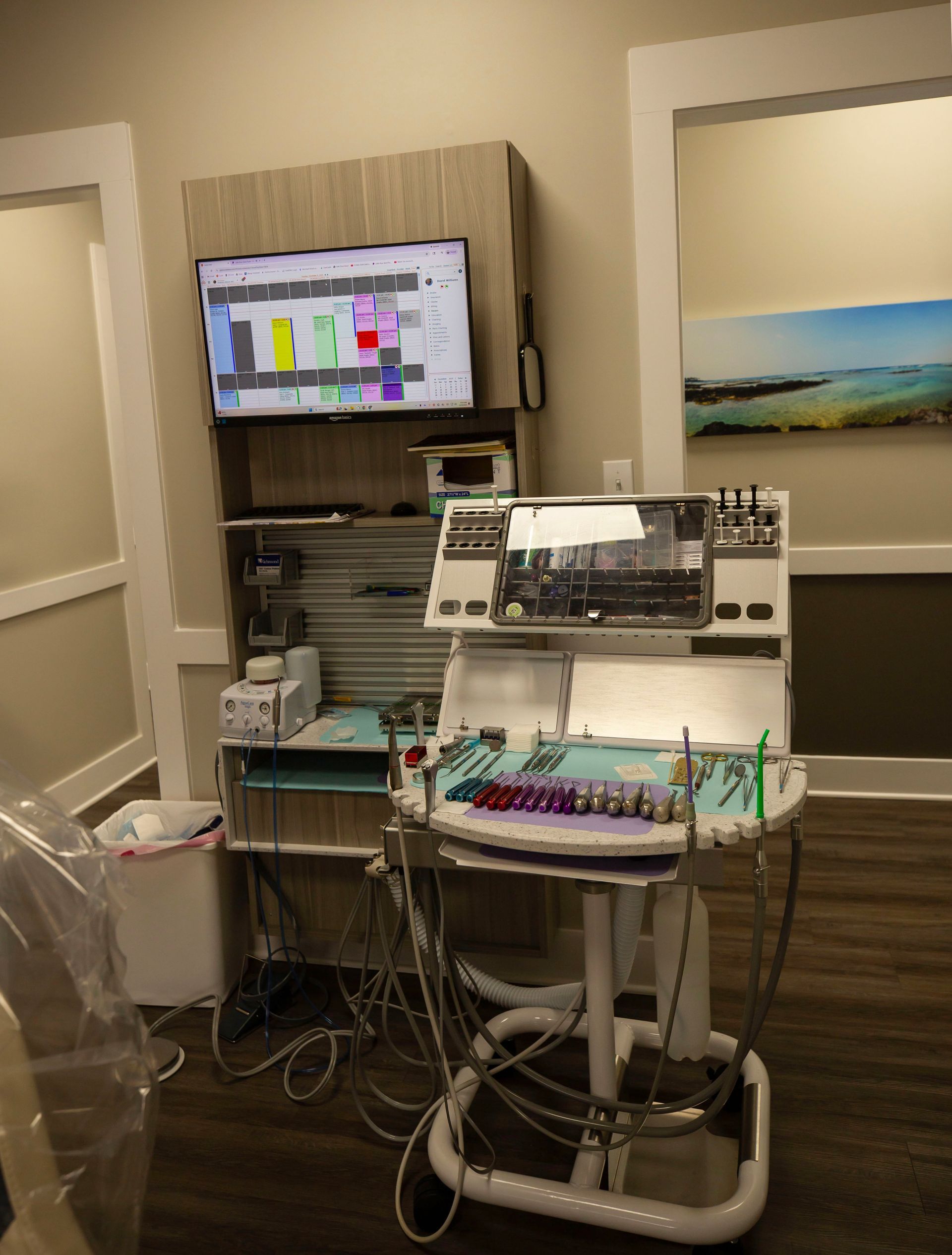 Southern Magnolia Dental logo in white on a blue background; a floral design and tagline.