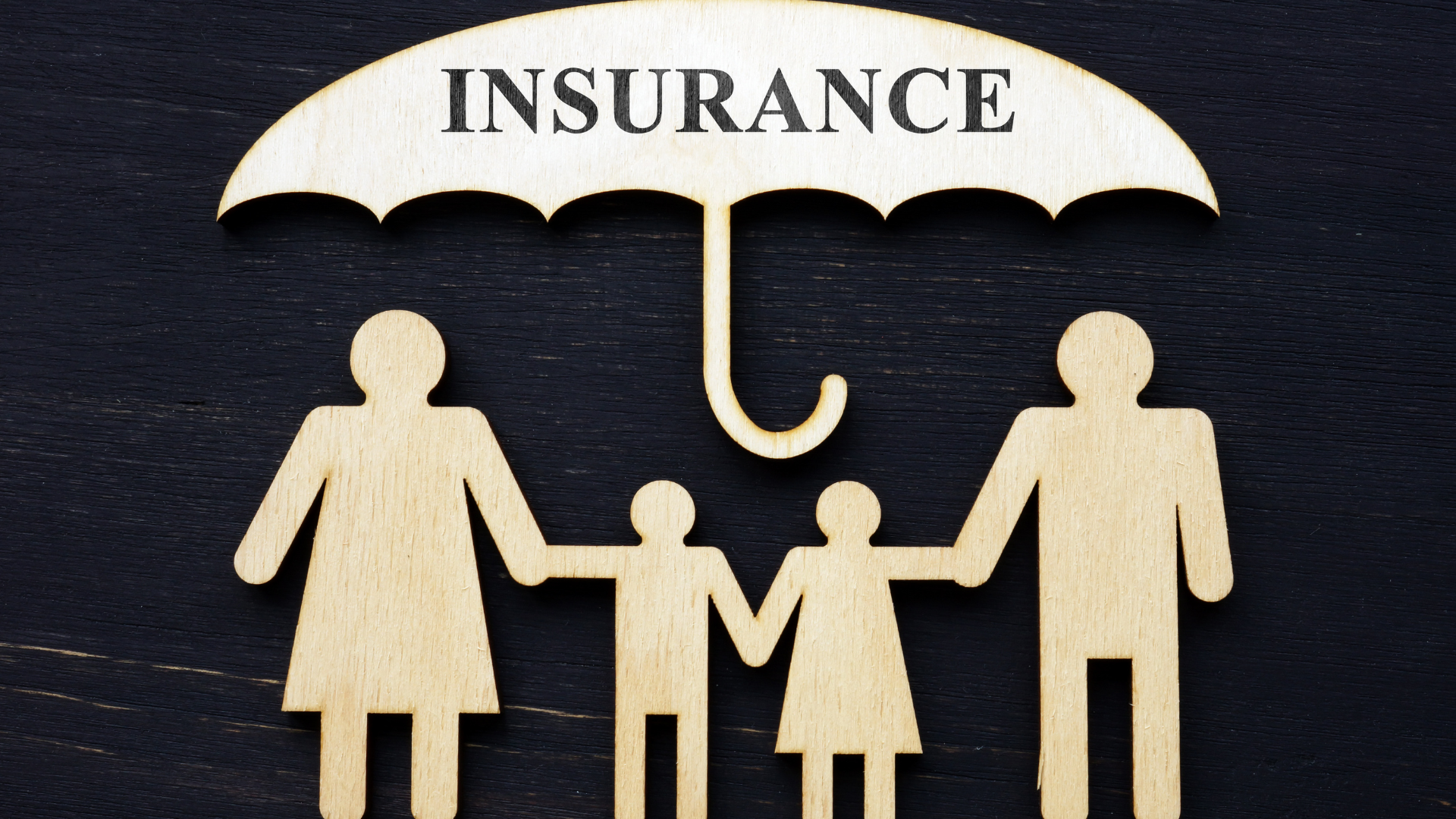 Illustration of a family under an umbrella labeled 'Insurance' symbolizing protection and coverage f