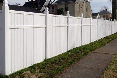 White vinyl fence in a residential neighborhood — Shepherdsville, KY — Schmidt Fencing