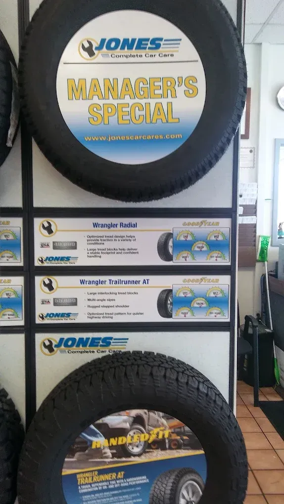 Jones Tires display with a “Manager’s Special” sign and mounted tire in a shop showroom | Jones Complete Car Care