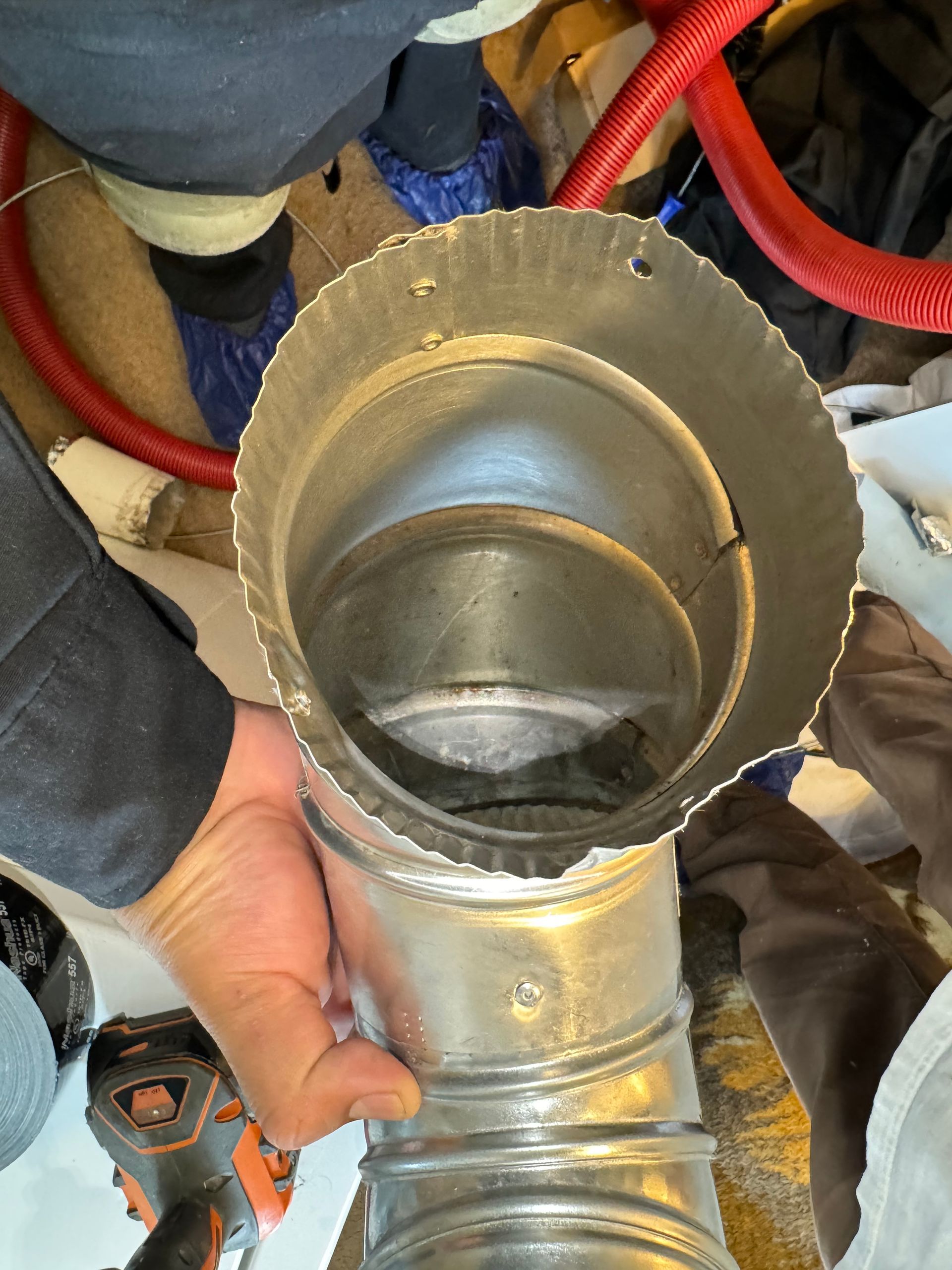 Right angle dryer vent cleaned of lint