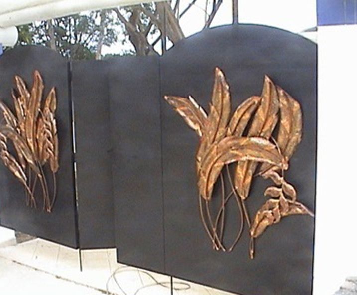 Gates with hanging heliconia in copper by Shane Bower Fiji 