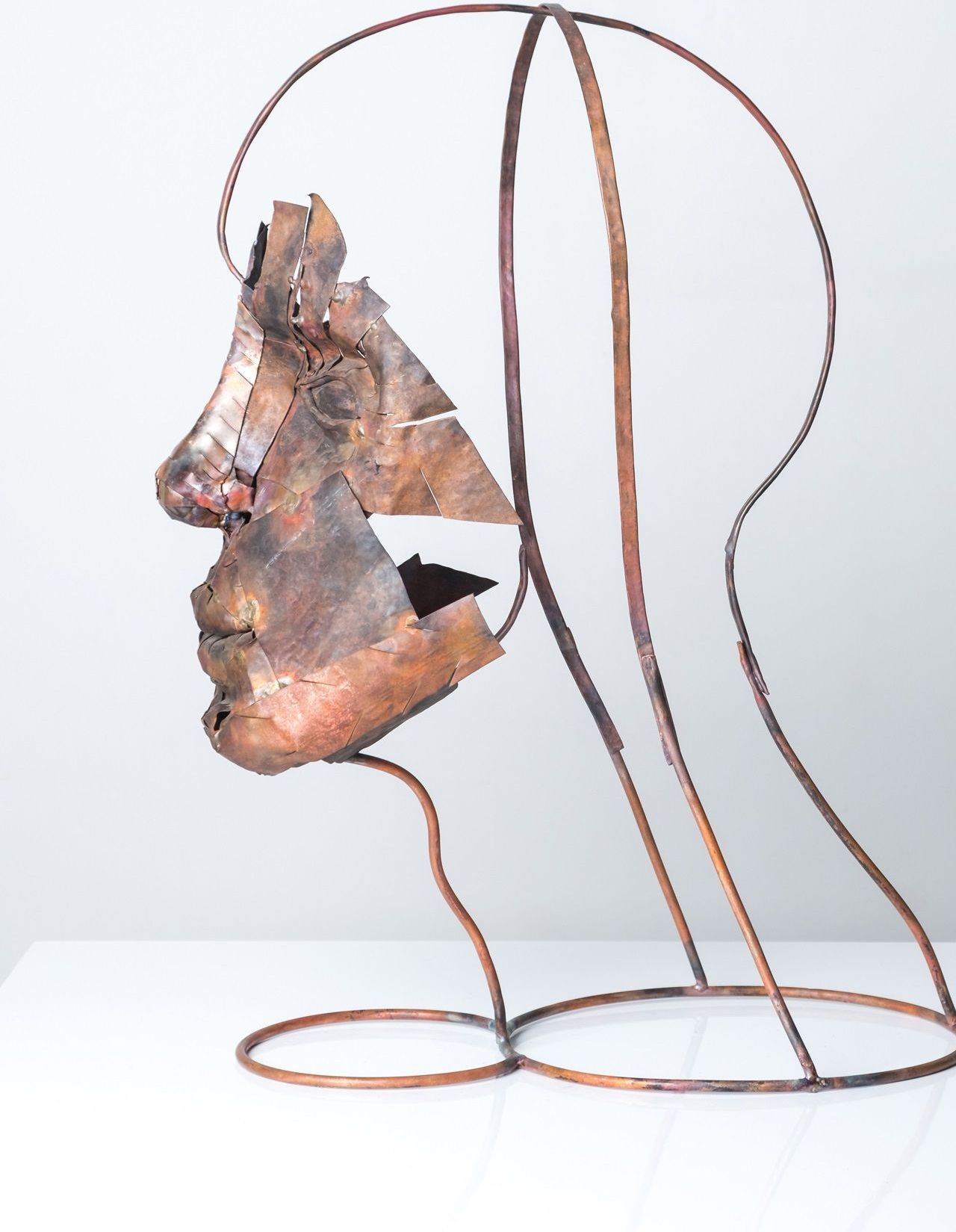 Human face in copper crafted by Shane Bower Fiji