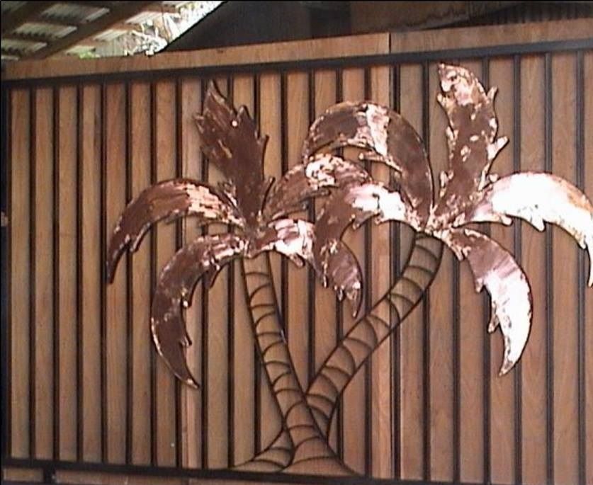 Sliding gate with two coconut trees in copper leaves by Shane Bower Fiji 