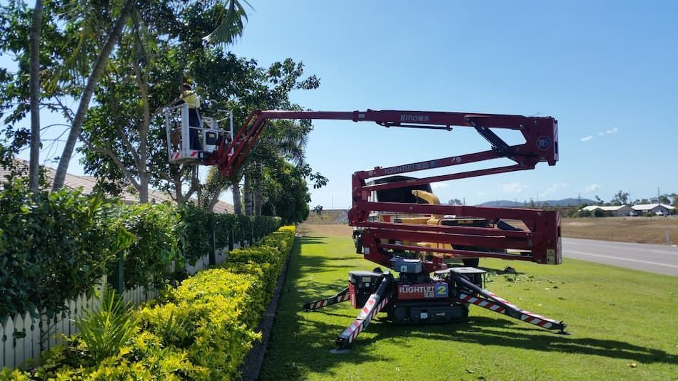 Person Operating a Lift For Tree Change NQ Townsville Tree Care Website - Arborist Charters Towers, QLD