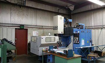 grey and blue machine - machine shop in Elkhart IN