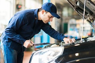 Mechanic Fixing a Car - Auto Repair and maintenance in Lakewood, Colorado