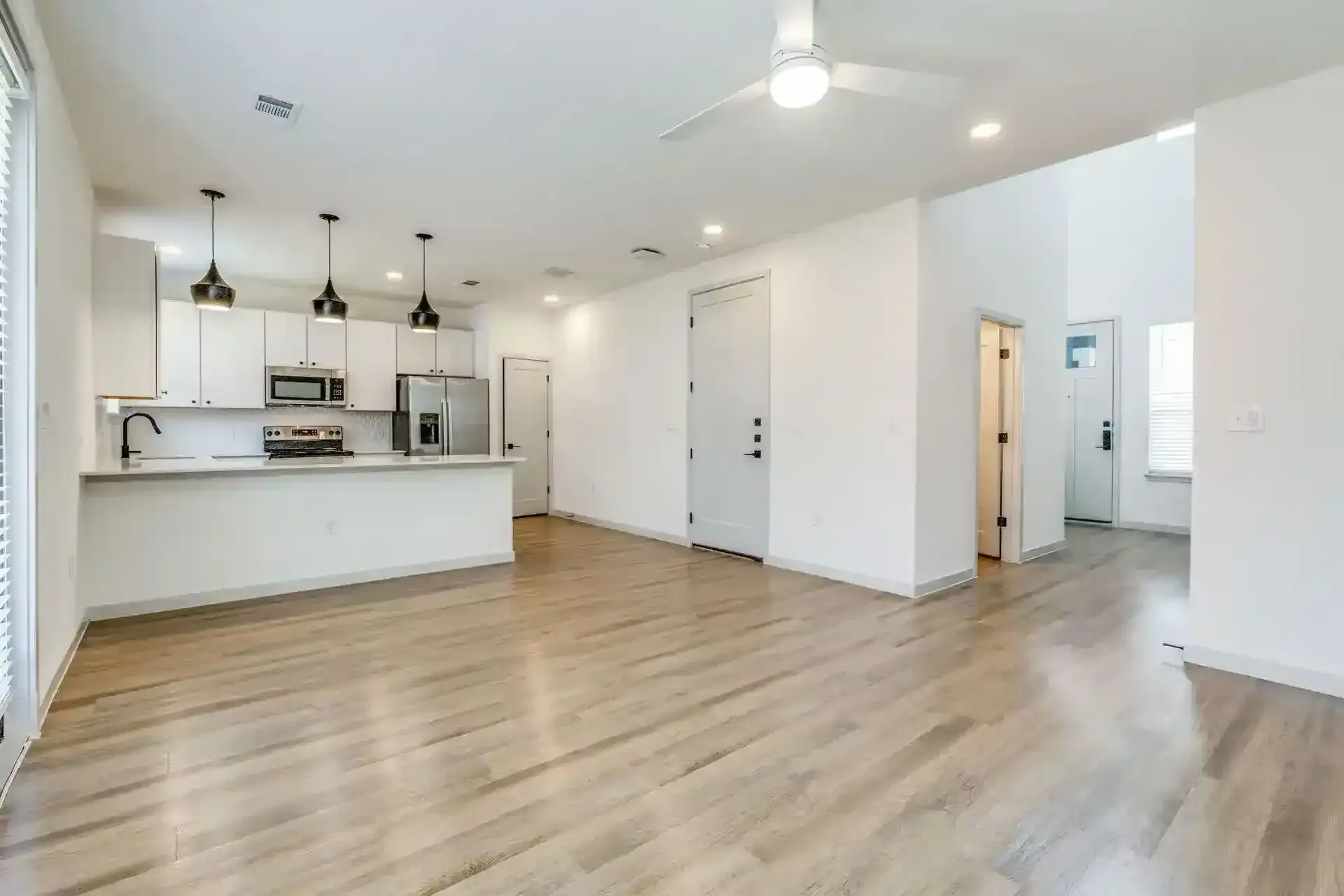 Modern apartment interior with kitchen and living area
