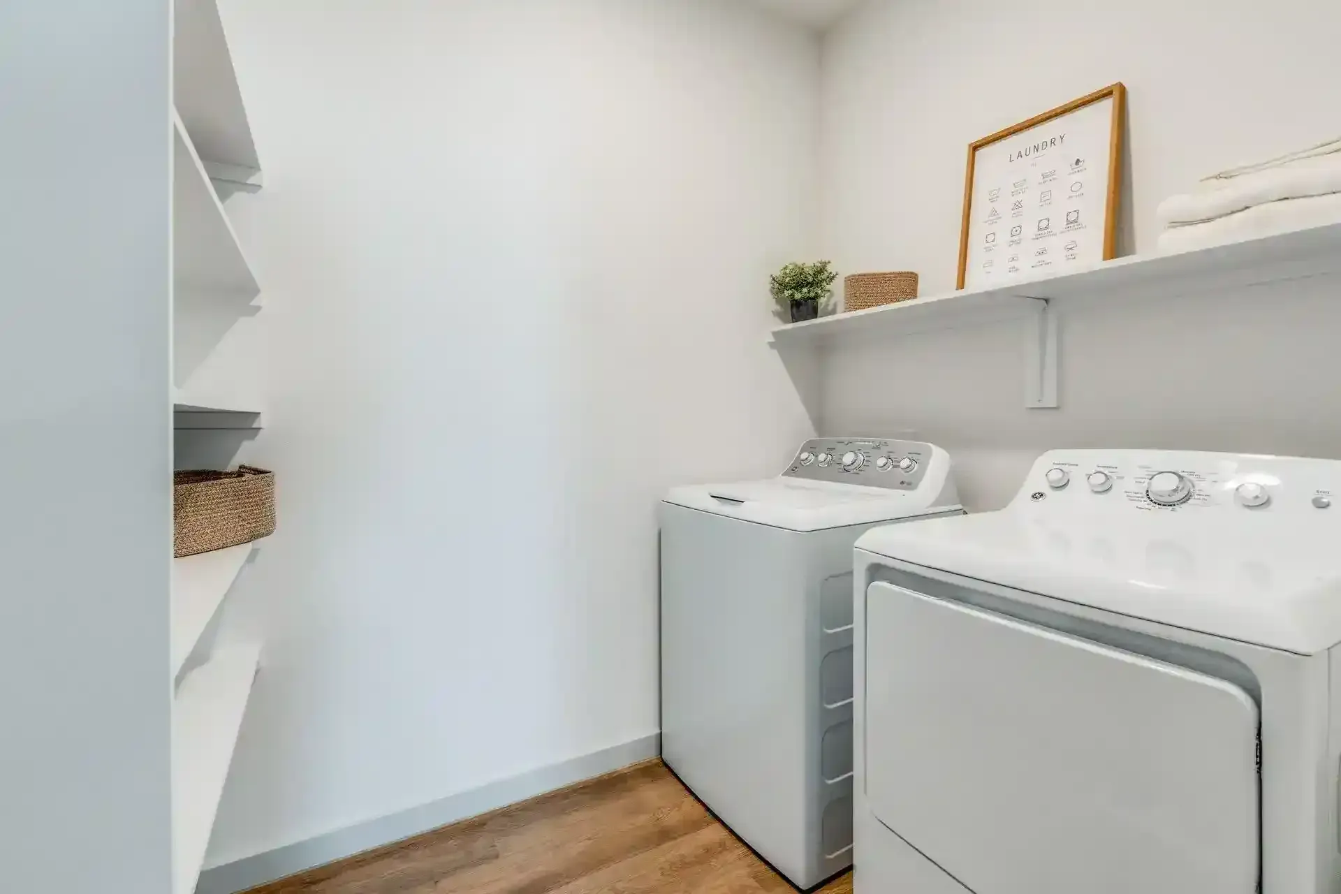 Laundry room with white washing machine and dryer