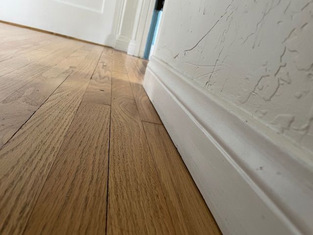 New flooring and baseboard replacements in Solana Beach.