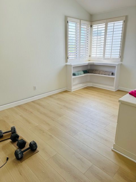 laminate floor and dumbbells on the floor in oceanside ca