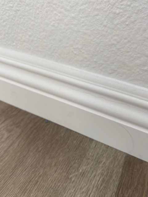 Floor updates and baseboard fitting in Encinitas homes.