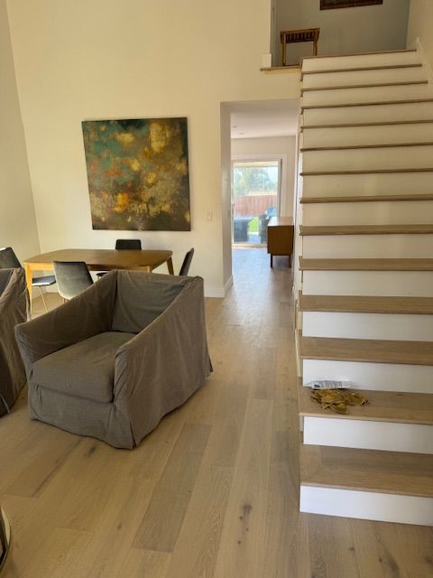 hardwood installation in carlsbad with flush stairnose and white risers