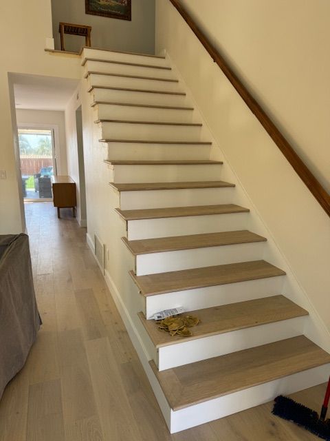 staircase with white risers in carlsbad ca new flooring project