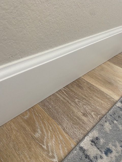 New hardwood floors and baseboard updates in Rancho Santa Fe.