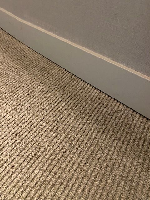 Flooring repairs and baseboard updates in La Mesa.
