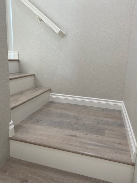 Flooring and baseboard fitting in North Park homes.