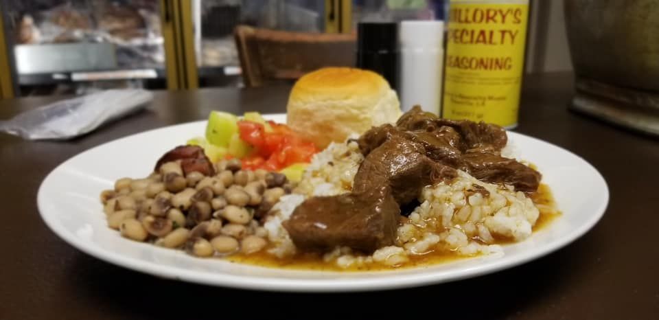 Ribs, beans, and biscuit. 