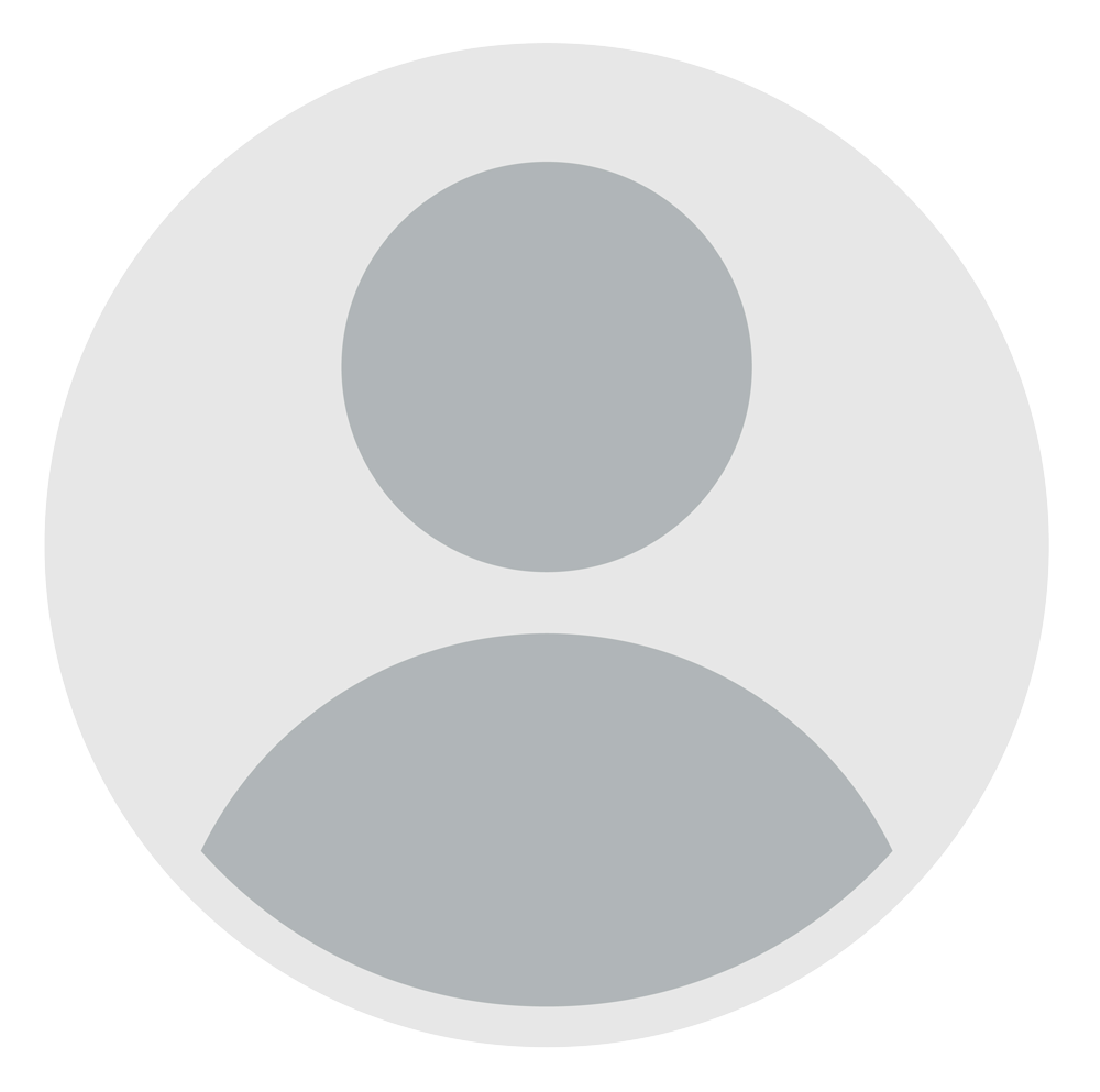 A gray circle with a person 's face in it.