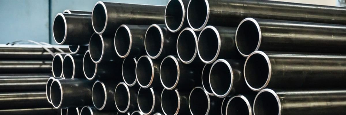 A Bunch of Metal Pipes Are Stacked on Top of Each Other — Top End Steel Supplies Darwin In Pinelands, NT