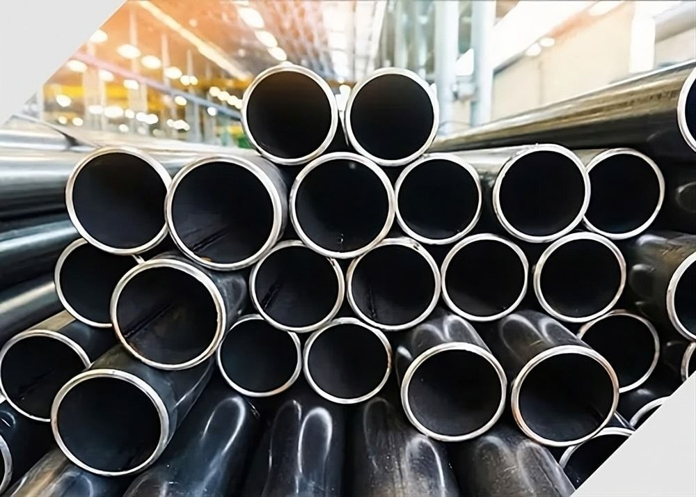 A Pile of Metal Pipes Stacked on Top of Each Other in a Factory — Top End Steel Supplies Darwin In Pinelands, NT