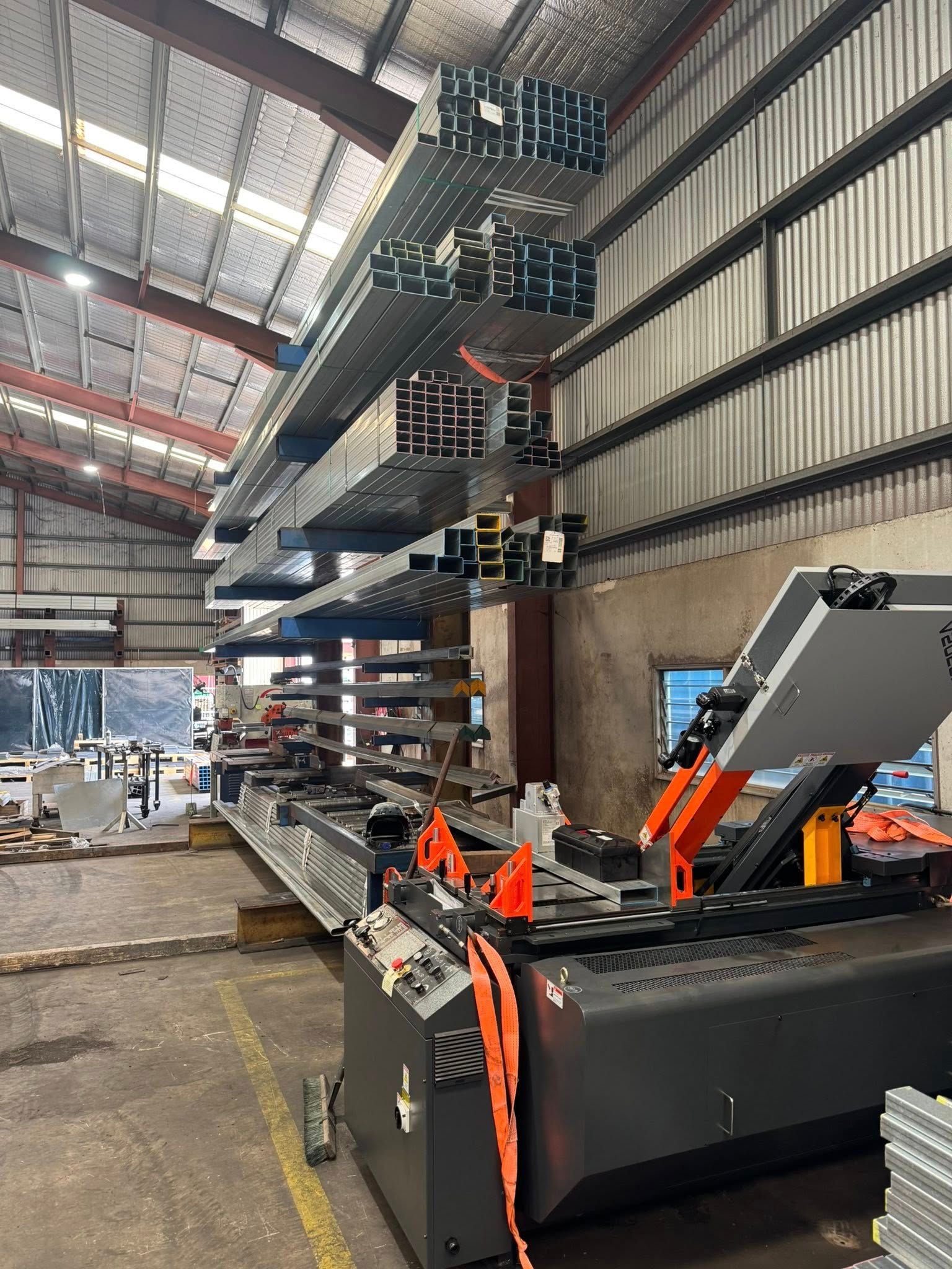 Metal Beams Stacked on Shelves in a Warehouse 