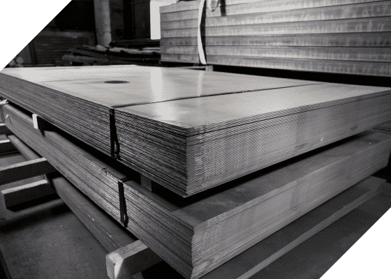 A Black and White Photo of a Stack of Metal Sheets — Top End Steel Supplies Darwin In Pinelands, NT