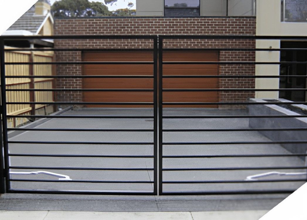 A Brick House With a Black Gate in Front of It — Top End Steel Supplies Darwin In Pinelands, NT