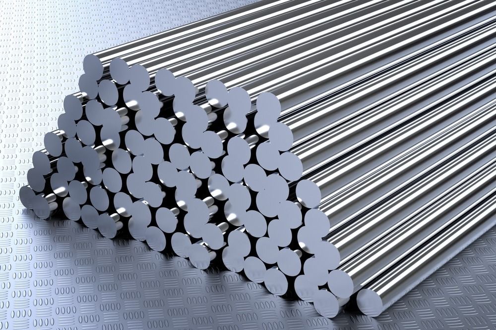 A Bunch of Stainless Steel Rods Stacked on Top of Each Other — Top End Steel Supplies Darwin In Pinelands, NT