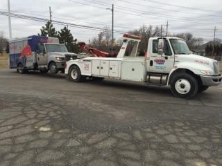 Tow Car Towing a Truck — Auburn Hills, MI — General Towing Auburn Hills